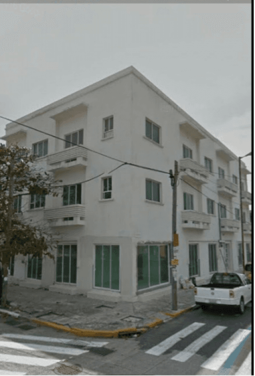 Edificio en venta con locales comerciales y deptos. - 1