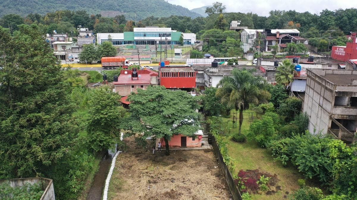 TERRENO CON CONSTRUCCION - 1